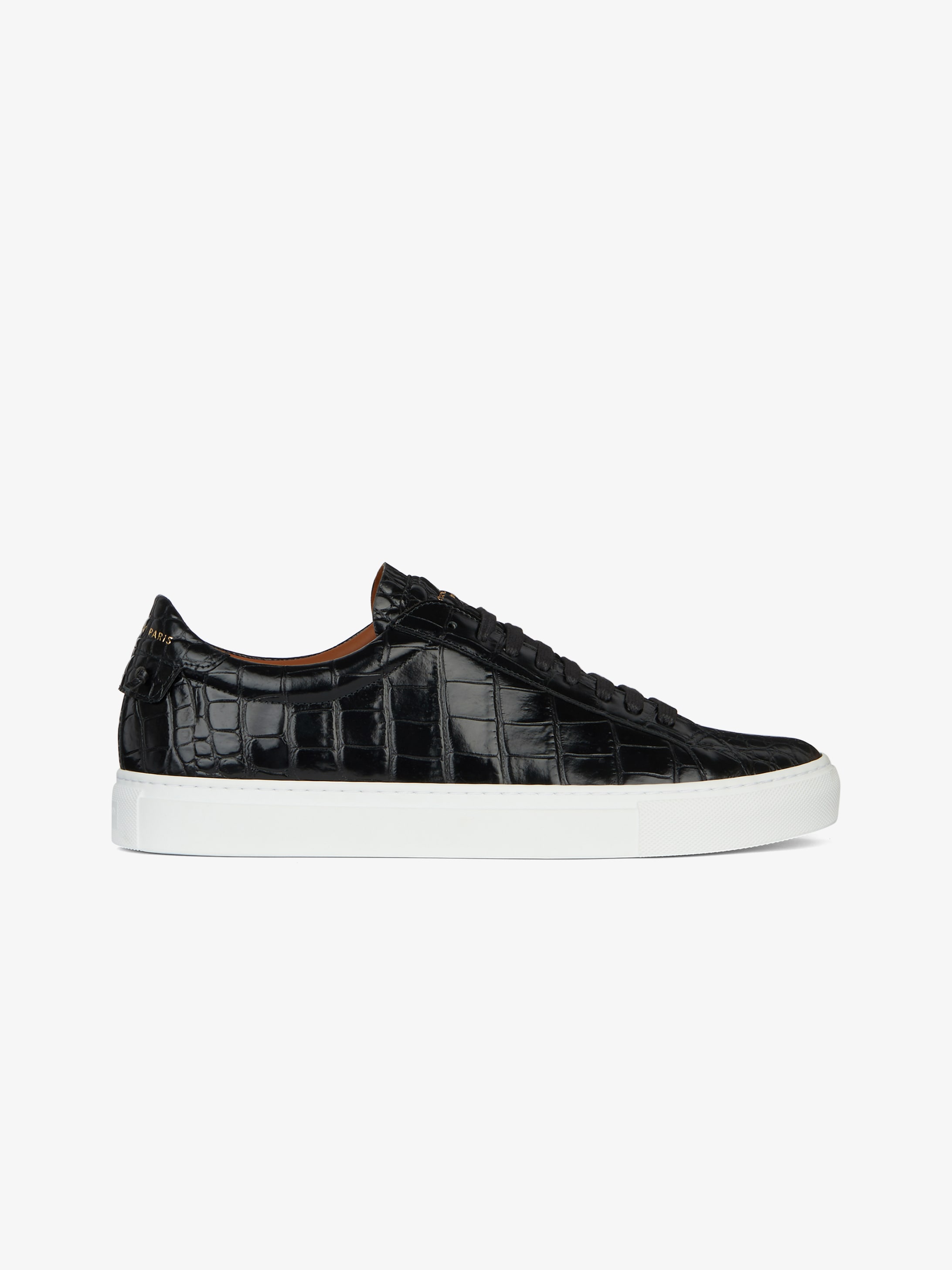 Sneakers in crocodile effect leather 
